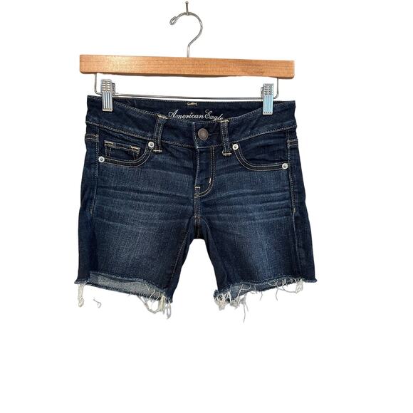 American Eagle Dark Wash Low Rise Raw Hem Cut Off Stretch Denim Jean Shorts 0 - Picture 1 of 6